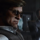 Shadowy figures from Call of Duty: Black Ops Cold War discuss conspiracies in a smoke-filled room.